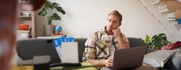 Person som ser bekymret på økonomiske dokumenter